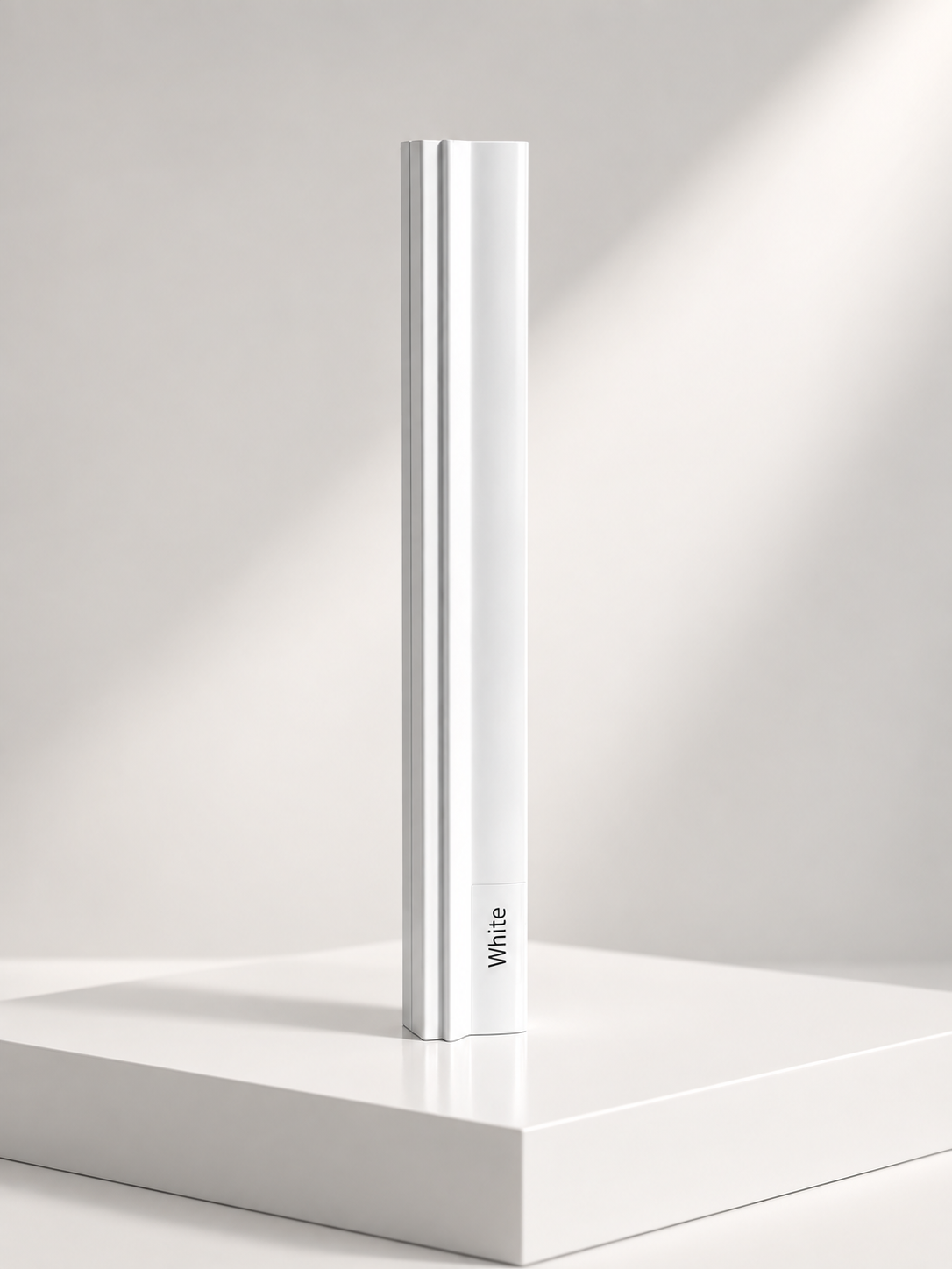 White sliding wardrobe door frame profile sample standing on a white plinth