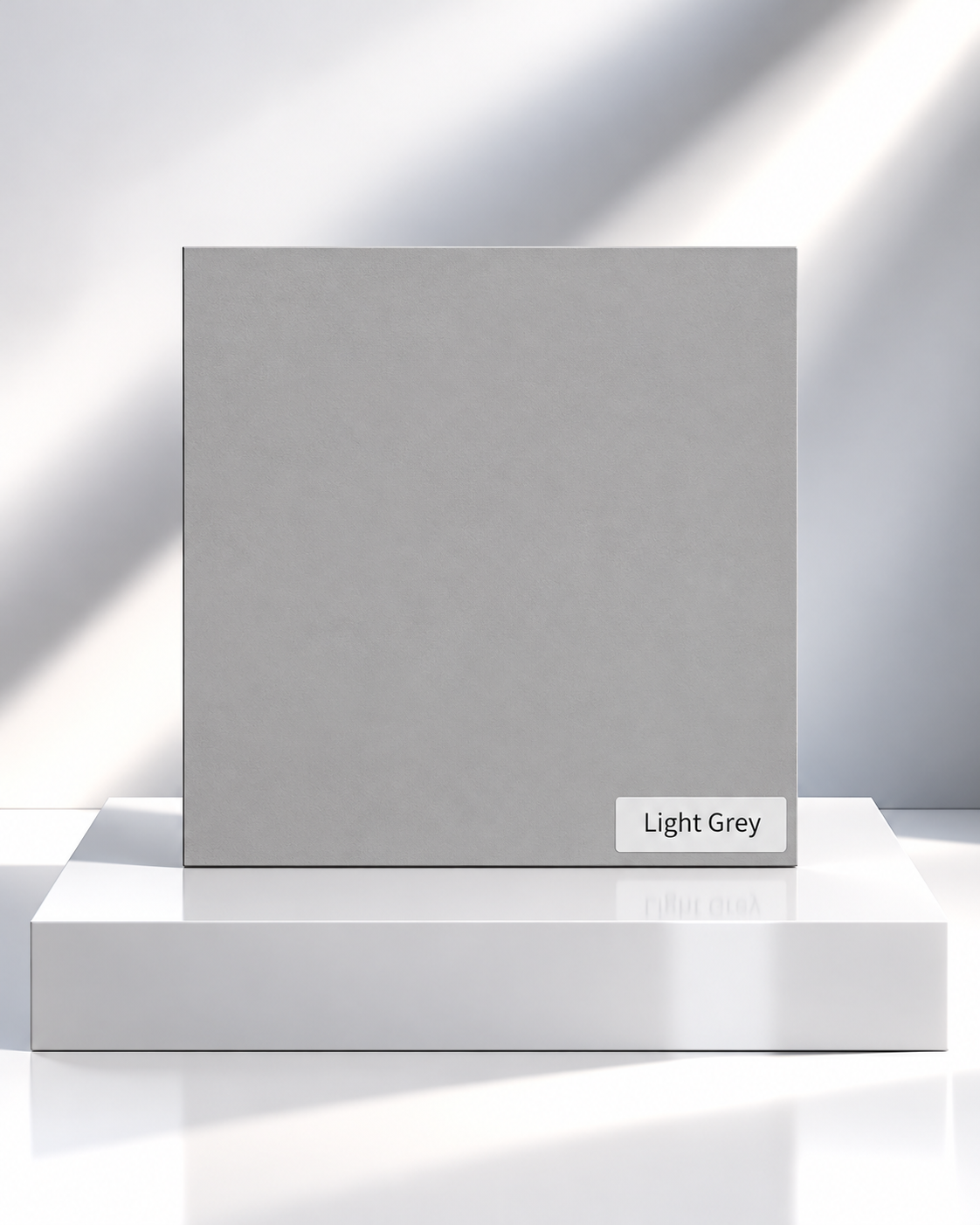 Light Grey solid wardrobe panel sample on a white plinth